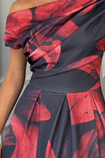 Close-up of a dress with red and black floral pattern