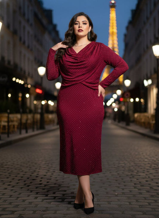 Woman in a burgundy dress standing on a street with the Eiffel Tower in the background